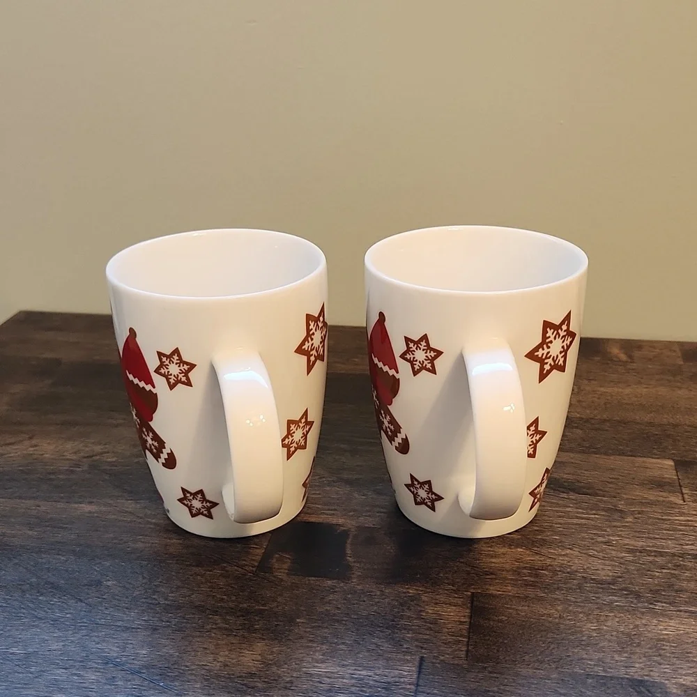 Set of ice skating gingerbread man mugs Crate & Barrel